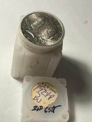 ROLL OF (20) 1924-P UNCIRCULATED PEACE SILVER DOLLARS AT GREYSHEET CDN BID PRICE.