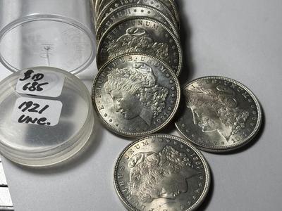 ROLL OF (20) 1921-P UNCIRCULATED MORGAN SILVER DOLLARS AT GREYSHEET CDN BID PRICE.