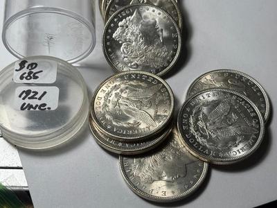 ROLL OF (20) 1921-P UNCIRCULATED MORGAN SILVER DOLLARS AT GREYSHEET CDN BID PRICE.