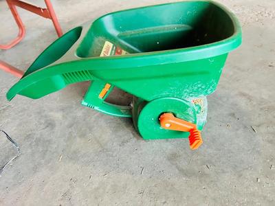 SCOTTS HAND FERTALIZER SPREADER, HEADGE TRIMMER AND WHEEL BARROW