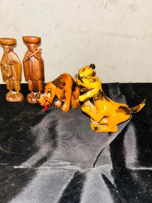 HAND CARVED HOUND DOGS AND MUSIC MEN