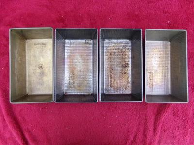 4 bread baking pans. Steel construction. 3 “OveneX” & 1 “Bake King”