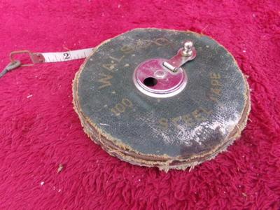 VTG Walsco brand 100 foot steel wind up tape measure.