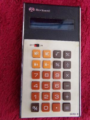 A driver set in case and a Rockwell calculator. Both in the OEM boxes.