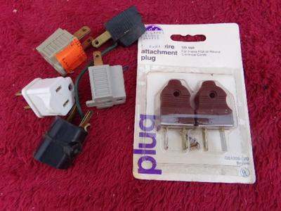 Some electrical plug pieces and parts.