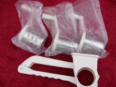 Cheese & vegetable grater, hand operated design. 3 different blade