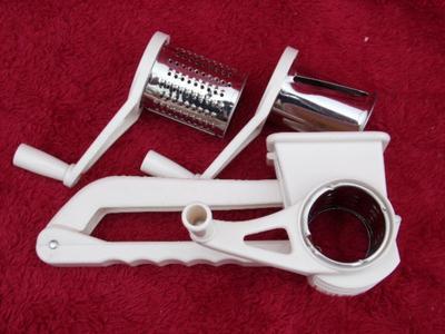 Cheese & vegetable grater, hand operated design. 3 different blade