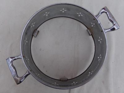 Large chrome bowl stand/trivet for table.
