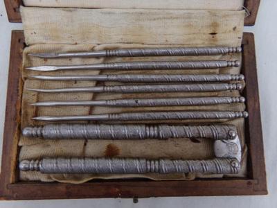 Classic VTG nut cracker w/6 pick set in a very nice wooden box.