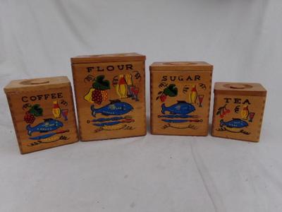 Nesting wooden canisters, set 4. Very nicely constructed of hardwood.
