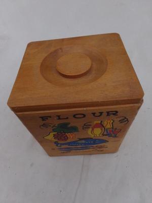 Nesting wooden canisters, set 4. Very nicely constructed of hardwood.