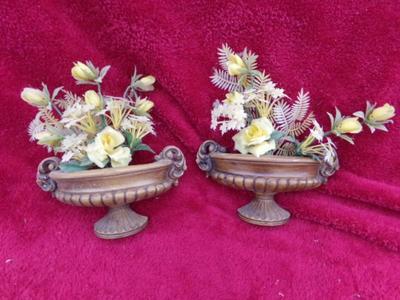 Two wall sconce decor pieces.