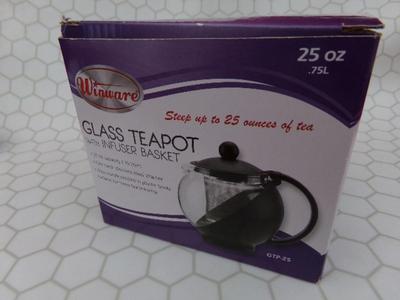 Glass Teapot w/infuser basket. Labeled 25 oz. Appears NEW IN BOX