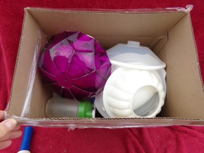 Pile #4 of plastic kitchenware in a big box.