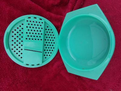 Pile #4 of plastic kitchenware in a big box.