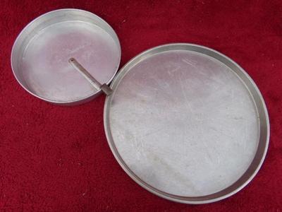 Pizza pan - 12" and a layer cake pan w/release mechanism - 8",