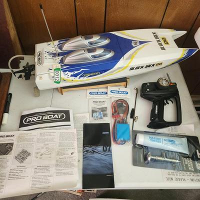 Pro Boat Blackhawk 26 R/c with controller and parts.