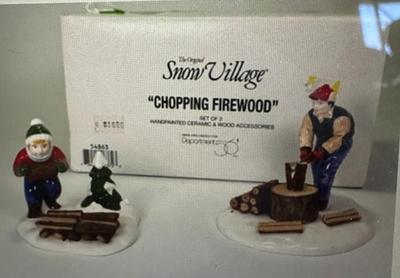 Dept 56 Snow Village. "Chopping Firewood"