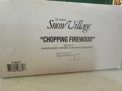 Dept 56 Snow Village. "Chopping Firewood"