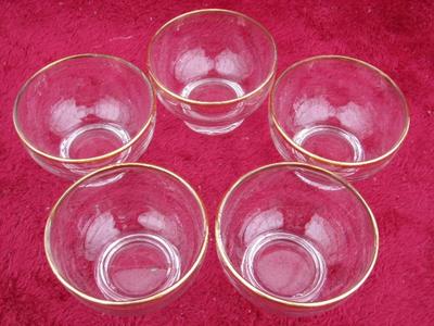 Set of 5 VTG handleless tea cups. Clear w/ gold rim trim. quite nice.