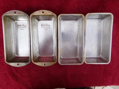 Group of 4 small metal bread baking pans, 2 Bake King, 2 generic.