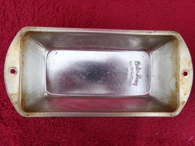 Group of 4 small metal bread baking pans, 2 Bake King, 2 generic.