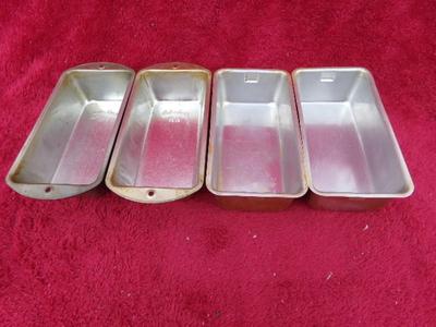 Group of 4 small metal bread baking pans, 2 Bake King, 2 generic.