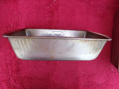 Group of 4 standard size metal bread pans. Generic.