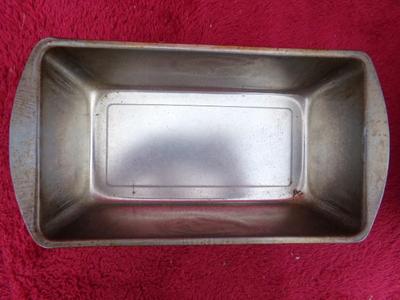 Group of 4 standard size metal bread pans. Generic.