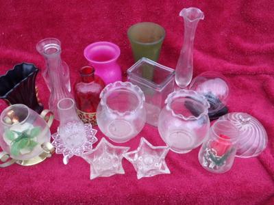 A collection of glassware items in a box.