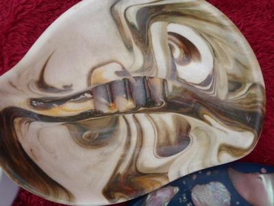A group of soap dishes and ashtrays, those go together don’t they?!