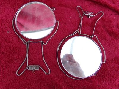 THREE hand mirrors, Also a little package of hair curler pins.