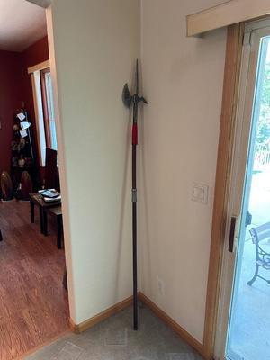 A HALBERD, A TWO-HANDED POLE WEAPON