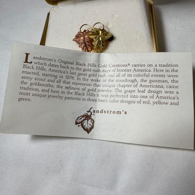 Landstrom’s Black Hills Gold Pin with Gold & Silver Chains & Pendants (K-HS)