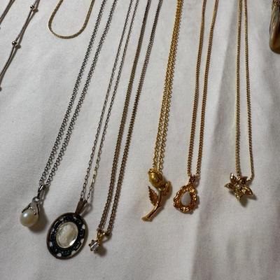 Landstrom’s Black Hills Gold Pin with Gold & Silver Chains & Pendants (K-HS)