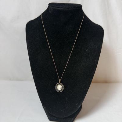 Landstrom’s Black Hills Gold Pin with Gold & Silver Chains & Pendants (K-HS)