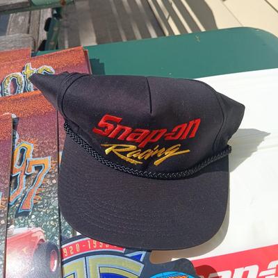 LOT 178: Snap-On License Plate Covers, Stickers, Plastic Bags, Cap & 1997 Snapshots Calendars