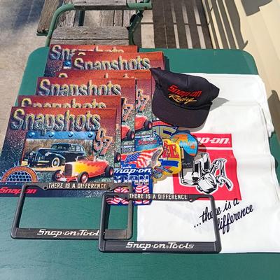 LOT 178: Snap-On License Plate Covers, Stickers, Plastic Bags, Cap & 1997 Snapshots Calendars