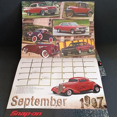 LOT 185: Snap-On License Plate Frames, Stickers, Plastic Bags, Snap-On Racing Cap & Snapshots 1997 Calendars