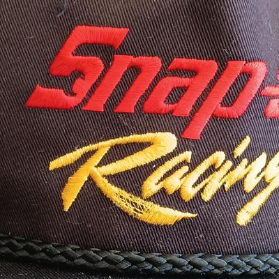 LOT 185: Snap-On License Plate Frames, Stickers, Plastic Bags, Snap-On Racing Cap & Snapshots 1997 Calendars