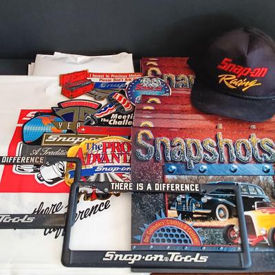 LOT 185: Snap-On License Plate Frames, Stickers, Plastic Bags, Snap-On Racing Cap & Snapshots 1997 Calendars