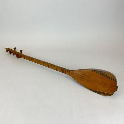 Sale Photo Thumbnail #749: Missing strings and tuning peg, body is made of mulberry wood
6 string tanbour
30.5" long