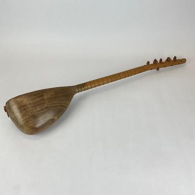 Sale Photo Thumbnail #753: Missing strings and tuning peg, body is made of mulberry wood
6 string tanbour
30.5" long