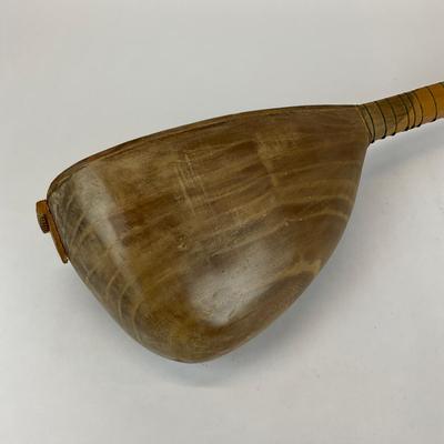 Sale Photo Thumbnail #752: Missing strings and tuning peg, body is made of mulberry wood
6 string tanbour
30.5" long