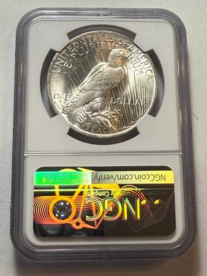 NGC CERTIFIED 1923-P MS63 PEACE SILVER DOLLAR AS PICTURED.