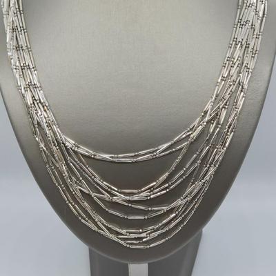 LOT 110J: Silver-Tone Graduated Strand Necklace, Woven Beaded Lariat, Two Glass Pendants, and More