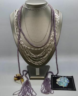 LOT 110J: Silver-Tone Graduated Strand Necklace, Woven Beaded Lariat, Two Glass Pendants, and More