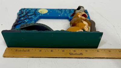 Sale Photo Thumbnail #425: In fair condition, the glass or plastic piece that covers picture is missing.