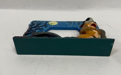 Sale Photo Thumbnail #426: In fair condition, the glass or plastic piece that covers picture is missing.
