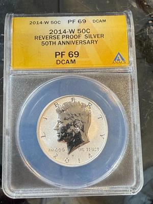 ANACS CERTIFIED 2014-W PROOF69 REVERSE PROOF SILVER KENNEDY HALF DOLLAR AS PICTURED.